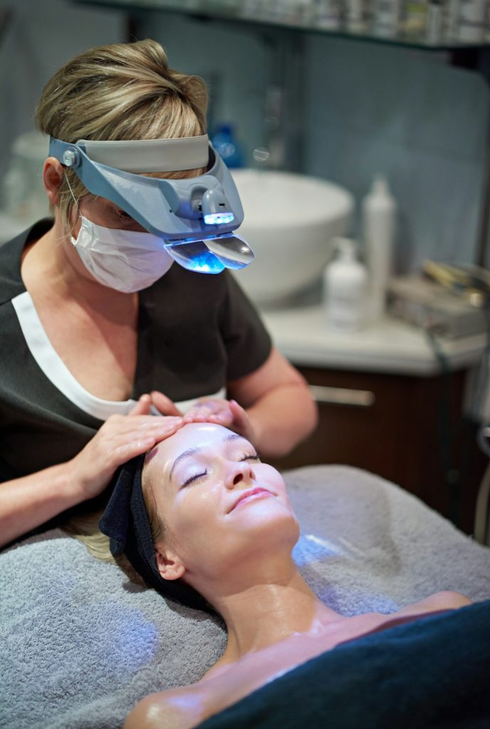 Deep skin rejuvenation. Shot of a woman getting a facial treatment at a clinic.